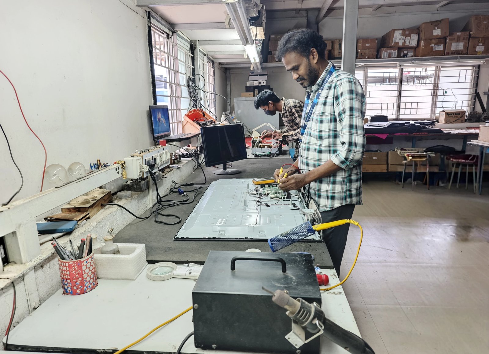 EV charger controller board repair for fleet charging hub